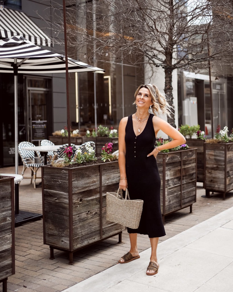 Her Fashioned Life fashion blogger wearing a black midi dress for summer