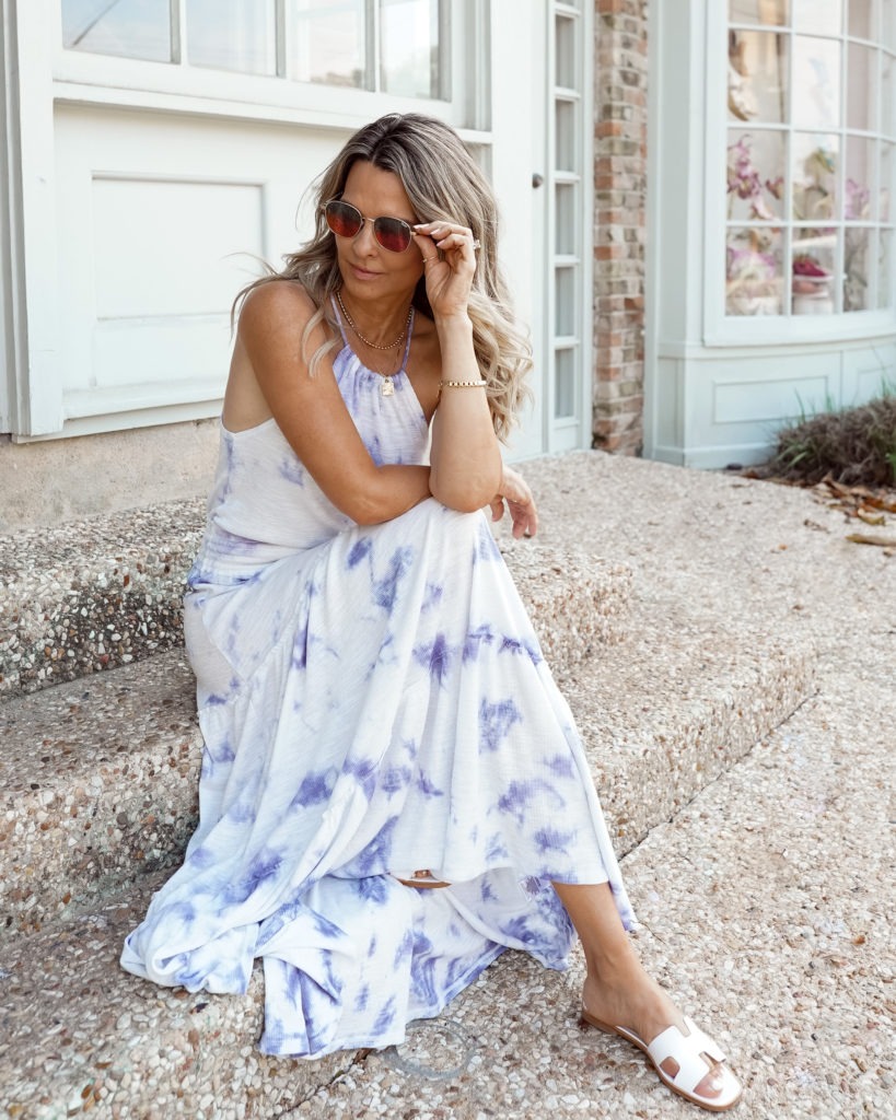 Her Fashioned Life wearing a purple and white tie dye maxi dress for summer and the beach