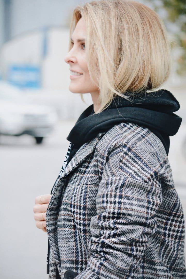 Black Hoodie Styled with Plaid Jacket - Her Fashioned Life