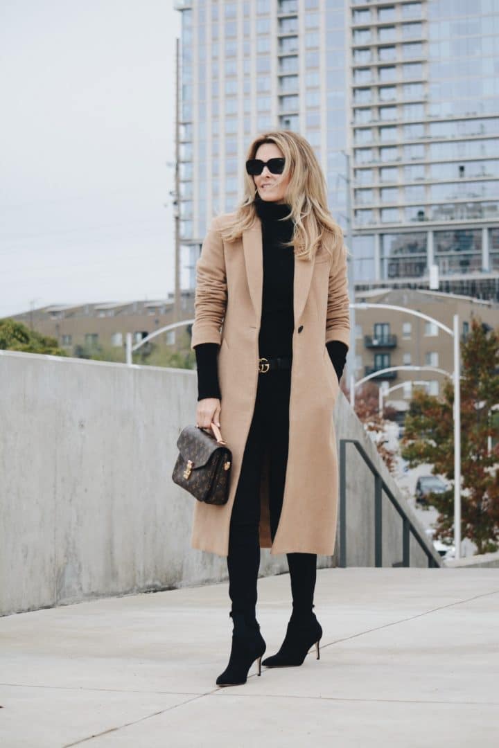 Rag & Bone Camel Coat styled with Black Sweater, Denim, Louis Vuitton Bag & Sock Booties - Her Fashioned Life